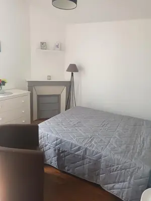 Un ou plusieurs lits dans un hébergement de l'établissement Appartement f3