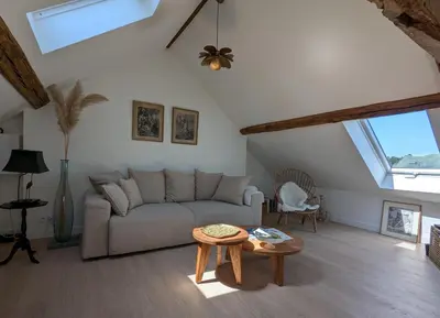 Coin salon dans l'établissement Chantilly sous les toits