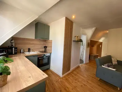 Cuisine ou kitchenette dans l'établissement L'Écrin de Verdure -334