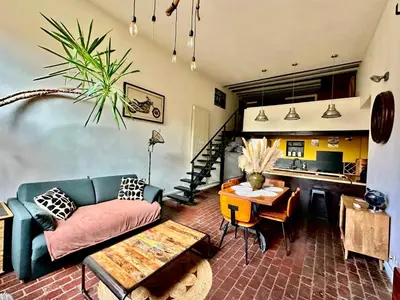 Coin salon dans l'établissement Le Loft Rouen Centre