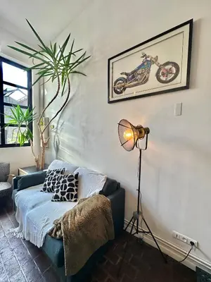 Coin salon dans l'établissement Le Loft Rouen Centre