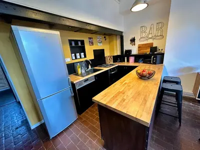 Cuisine ou kitchenette dans l'établissement Le Loft Rouen Centre