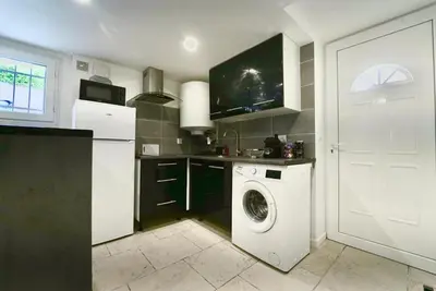 Cuisine ou kitchenette dans l'établissement Appartement tout confort