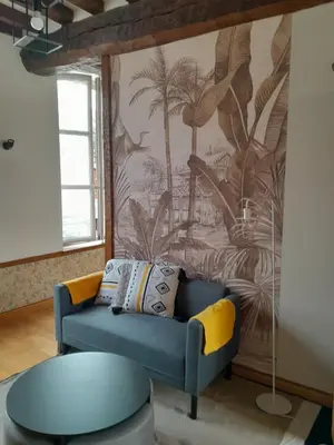 Coin salon dans l'établissement LA Coloc