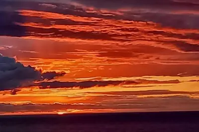 Lever ou coucher de soleil vu de l'appartement ou à proximité