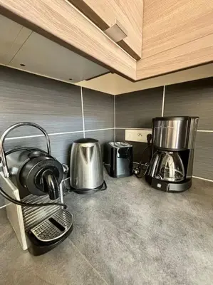 Cuisine ou kitchenette dans l'établissement Le Charmant Au cœur de Dieppe 2ème étage 6 personnes