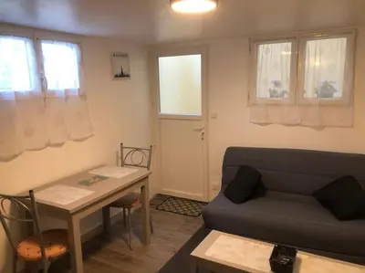Coin salon dans l'établissement Charmant logement à Déville proche université