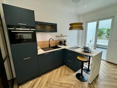Cuisine ou kitchenette dans l'établissement Cocon centre ville - gare
