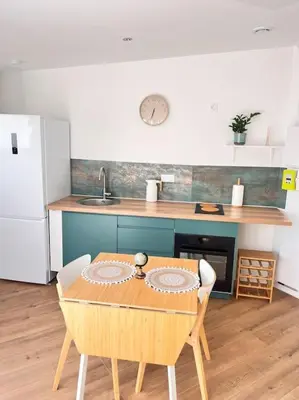Cuisine ou kitchenette dans l'établissement La belle Iris