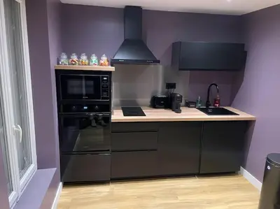 Cuisine ou kitchenette dans l'établissement Le Cocon des Granges - Suite Sauna Jaccuzi SPA