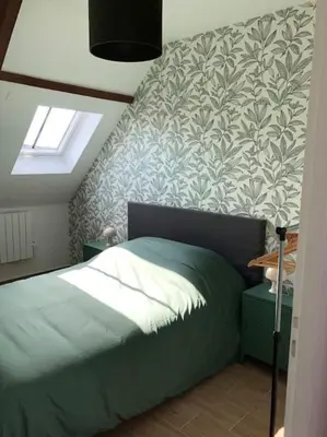 Un ou plusieurs lits dans un hébergement de l'établissement Appartement F2