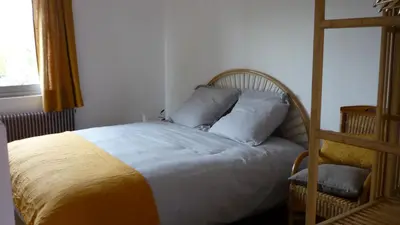 Un ou plusieurs lits dans un hébergement de l'établissement Appartement Chez Caroline