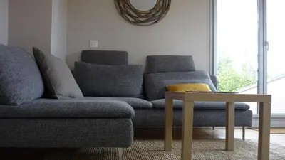 Coin salon dans l'établissement Appartement Chez Caroline