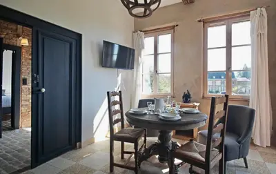 Télévision ou salle de divertissement dans l'établissement Orangerie du chateau