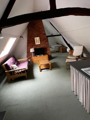 Coin salon dans l'établissement Maison de campagne du XVIIe siècle