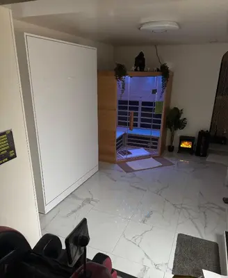 Coin salon dans l'établissement Jacuzzi sauna 5min pied gare