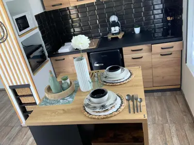 Cuisine ou kitchenette dans l'établissement La Pause Cosy