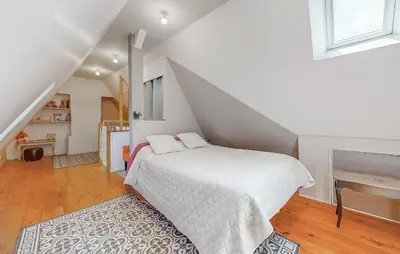 Un ou plusieurs lits dans un hébergement de l'établissement Stunning Home In Arques La Bataille Arq