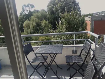 Balcon ou terrasse dans l'établissement Les baigneurs apt très calme 2 chambres 58 m2 parking privé et balcon
