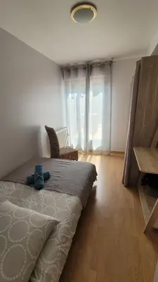 Un ou plusieurs lits dans un hébergement de l'établissement Grand appartement 4 chambres - grande terrasse - Cergy Centre