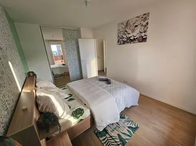 Un ou plusieurs lits dans un hébergement de l'établissement grand appartement 2 pièces en résidence