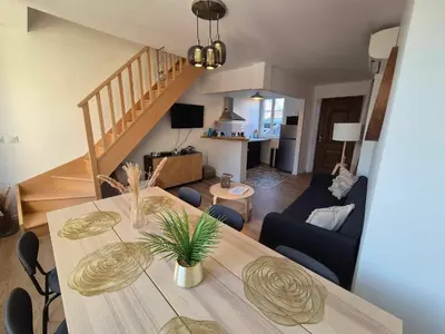 Coin salon dans l'établissement Maison Les 4 Mers