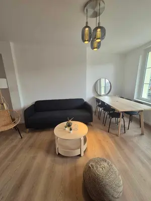 Coin salon dans l'établissement Maison Les 4 Mers