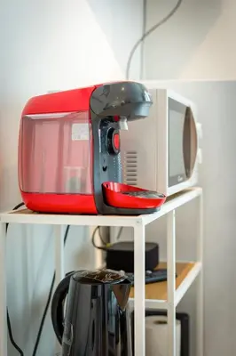 Cuisine ou kitchenette dans l'établissement Rollin appartement 3 personnes avec Netflix au calme !