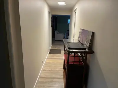 Télévision ou salle de divertissement dans l'établissement A l'orée de la forêt