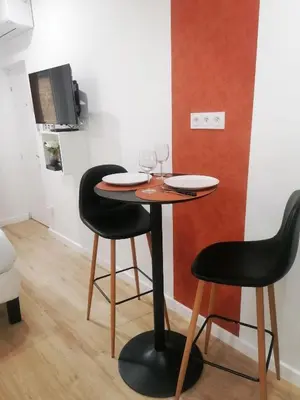 Télévision ou salle de divertissement dans l'établissement Le cocon rouennais - Terrasse - Climatisation - Gare