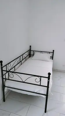 Un ou plusieurs lits dans un hébergement de l'établissement Appartement meublé neuf, près de Paris et Beauvais
