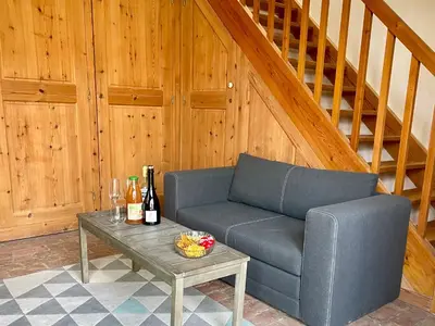Coin salon dans l'établissement La petite Maison en Normandie
