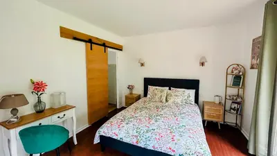 Un ou plusieurs lits dans un hébergement de l'établissement Cottage de Flesselles