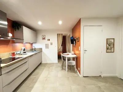 Cuisine ou kitchenette dans l'établissement Cocon Urbain à Saint-Leu-d'Esserent