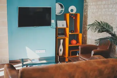 Télévision ou salle de divertissement dans l'établissement LA LUCIOLE longère 65 m2 climatisée & lumineuse