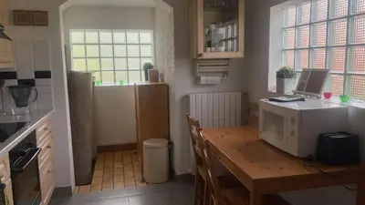 Cuisine ou kitchenette dans l'établissement Mésange d Atlas - North West Paris Suburbs