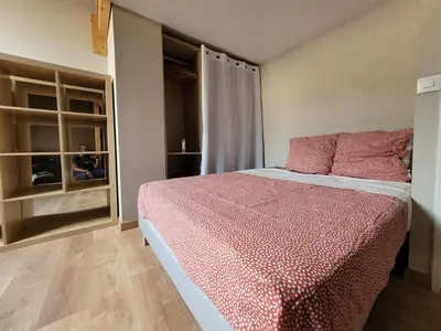 Un ou plusieurs lits dans un hébergement de l'établissement Chambre cosy en appartement partagé
