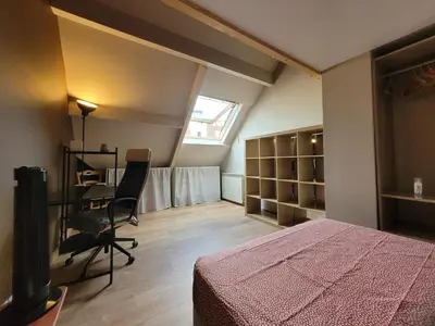 Un ou plusieurs lits dans un hébergement de l'établissement Chambre cosy en appartement partagé