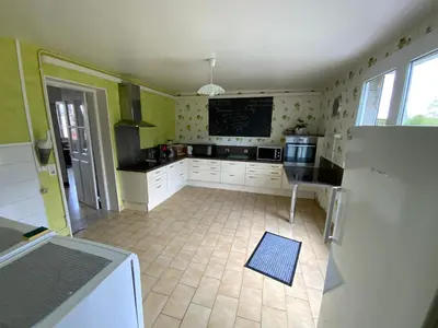 Télévision ou salle de divertissement dans l'établissement Chez Marguerite