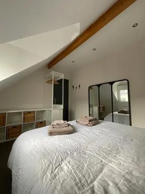 Un ou plusieurs lits dans un hébergement de l'établissement Chambres d'hôtes à 30 min de Paris