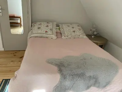 Un ou plusieurs lits dans un hébergement de l'établissement Maison moderne à Ancourt avec parking privé
