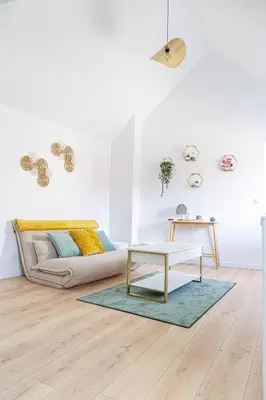 Coin salon dans l'établissement Le Charmant Cormeillais
