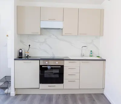 Cuisine ou kitchenette dans l'établissement Le Cocon Cormeillais