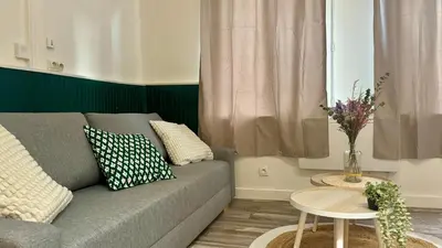 Coin salon dans l'établissement Appartement calme et cosy - Proche centre