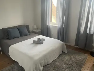 Un ou plusieurs lits dans un hébergement de l'établissement Ferme Cosy et Paisible au Bord de l'Eure