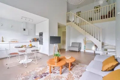 Coin salon dans l'établissement Le Riviera Port Cergy - Elégant Duplex étoilé