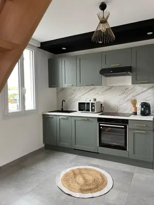 Cuisine ou kitchenette dans l'établissement Eau gîte