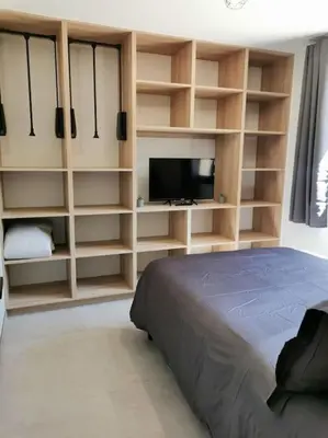 Un ou plusieurs lits dans un hébergement de l'établissement Appartement centre ville rdc