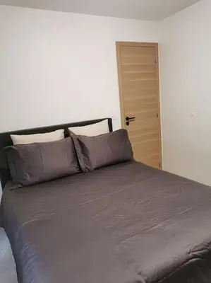Un ou plusieurs lits dans un hébergement de l'établissement Appartement centre ville rdc