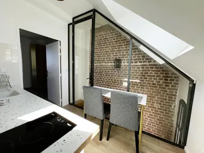 Un ou plusieurs lits dans un hébergement de l'établissement villa Konny studio 1er étage